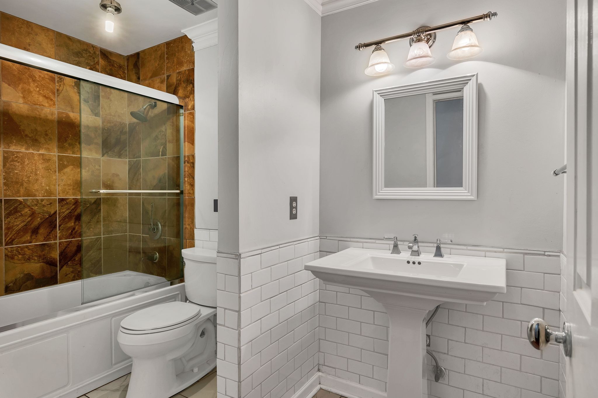 697 Watson Branch Drive Franklin, TN 37064 - Photo 12 of 36 a bathroom with a sink toilet and shower