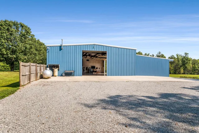a view of a golf course with a trees