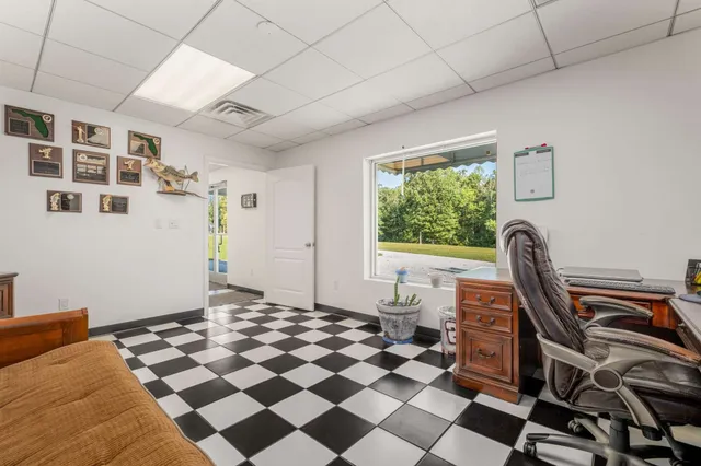 a bathroom with a sink toilet vanity and shower