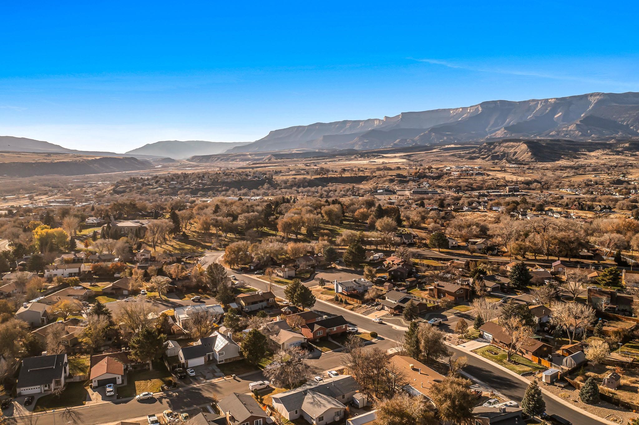 759 Elder Court Rifle, CO 81650 - Photo 20 of 26 an aerial view of residential house and green space
