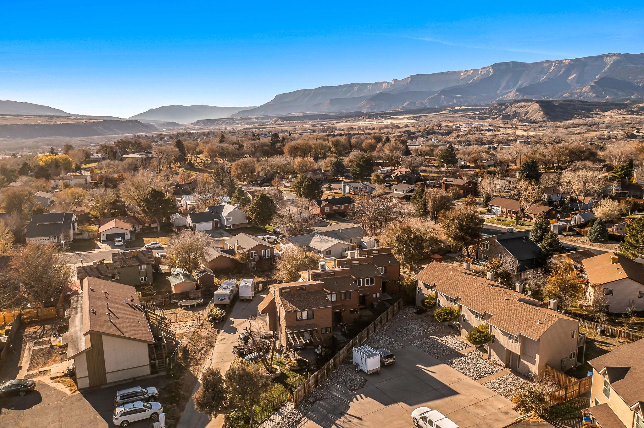 759 Elder Court Rifle, CO 81650 - Photo 21 of 26 an aerial view of residential house and green space