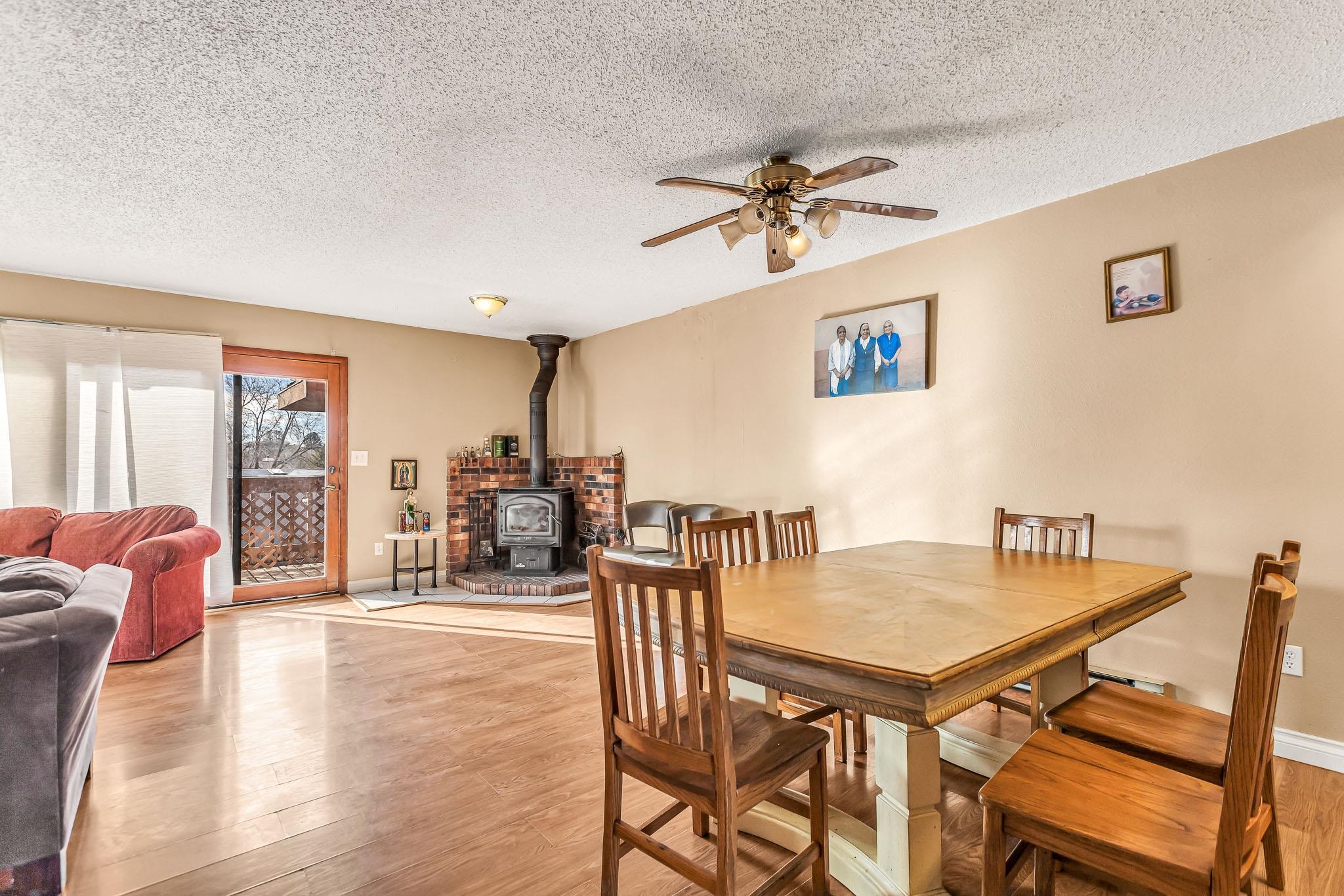 759 Elder Court Rifle, CO 81650 - Photo 4 of 26 a view of a dining room with furniture and a potted plant