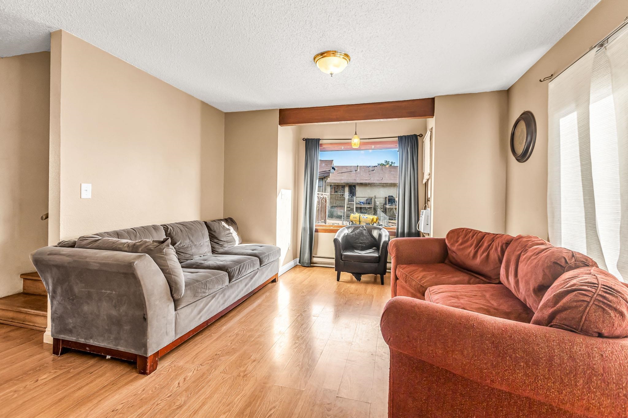 759 Elder Court Rifle, CO 81650 - Photo 5 of 26 a living room with furniture and a couch