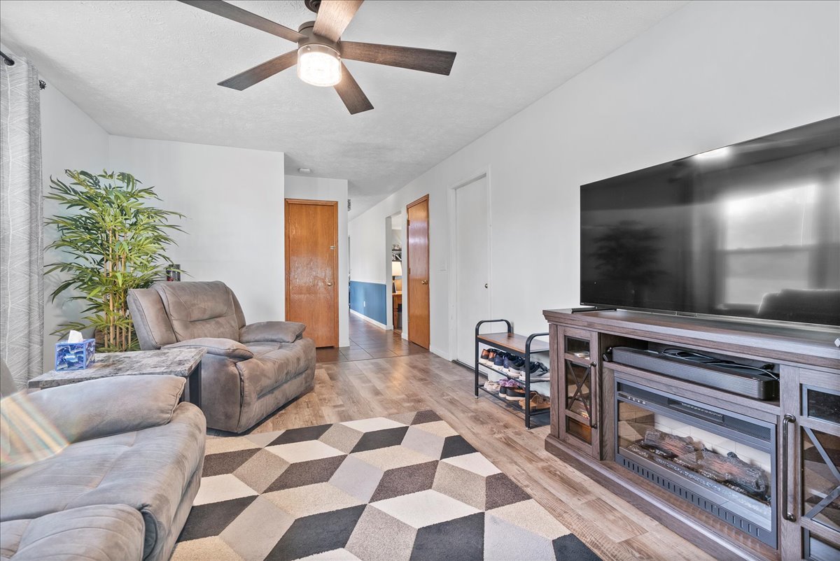 1421 Godfrey Drive Normal, IL 61761 - Photo 14 of 28 a living room with furniture and a flat screen tv