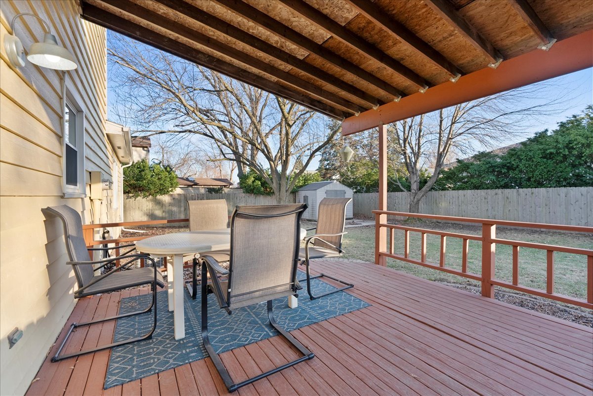 1421 Godfrey Drive Normal, IL 61761 - Photo 22 of 28 a view of balcony with furniture and wooden floor