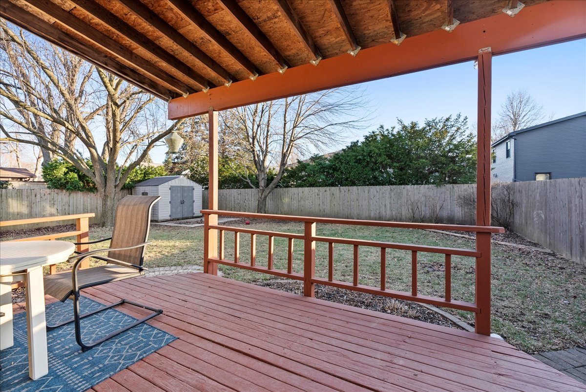 1421 Godfrey Drive Normal, IL 61761 - Photo 23 of 28 a view of deck with wooden floor and outdoor seating