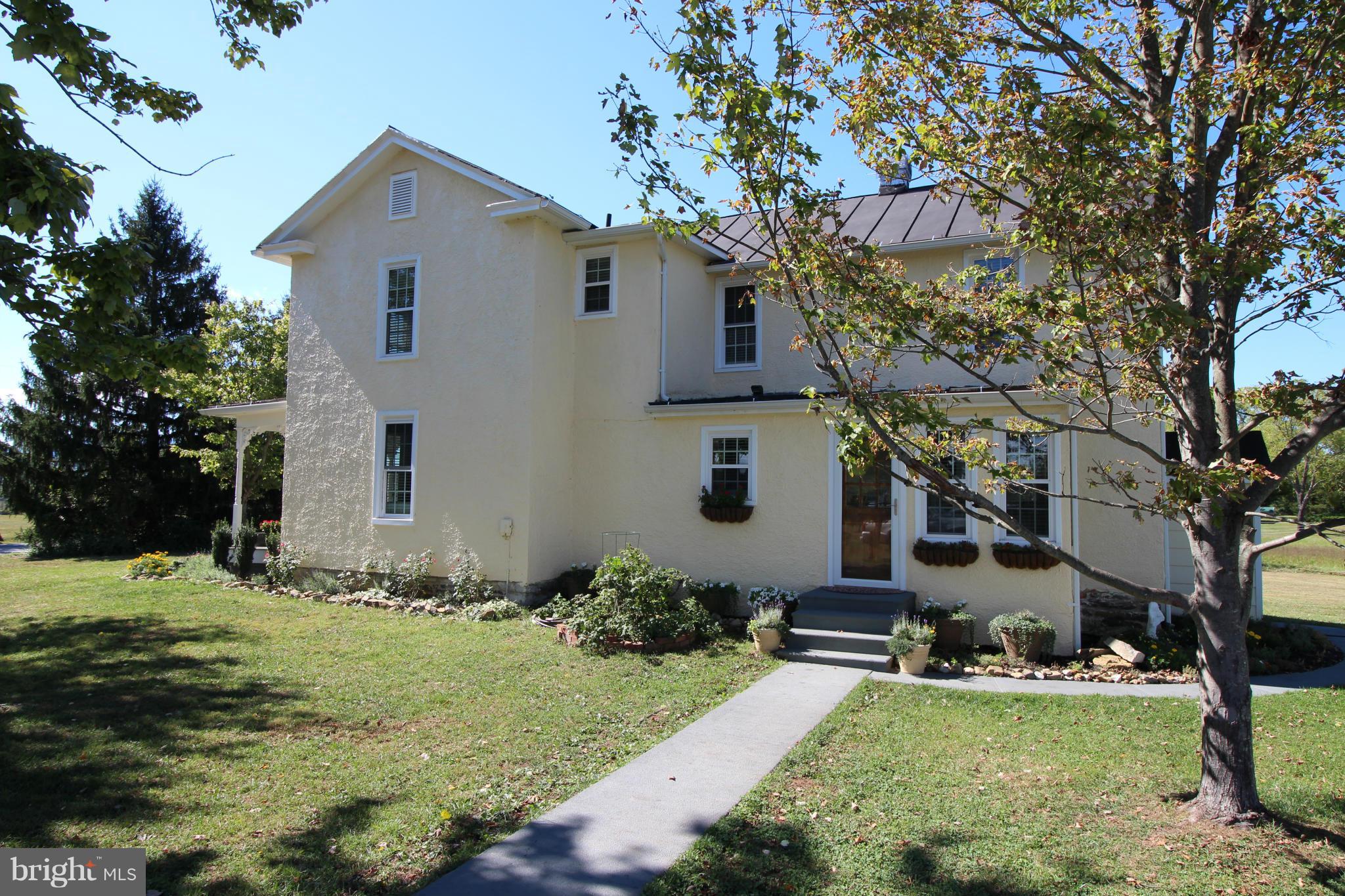 2280 Reliance Road Middletown, VA 22645 - Photo 2 of 28 a front view of a house with a yard