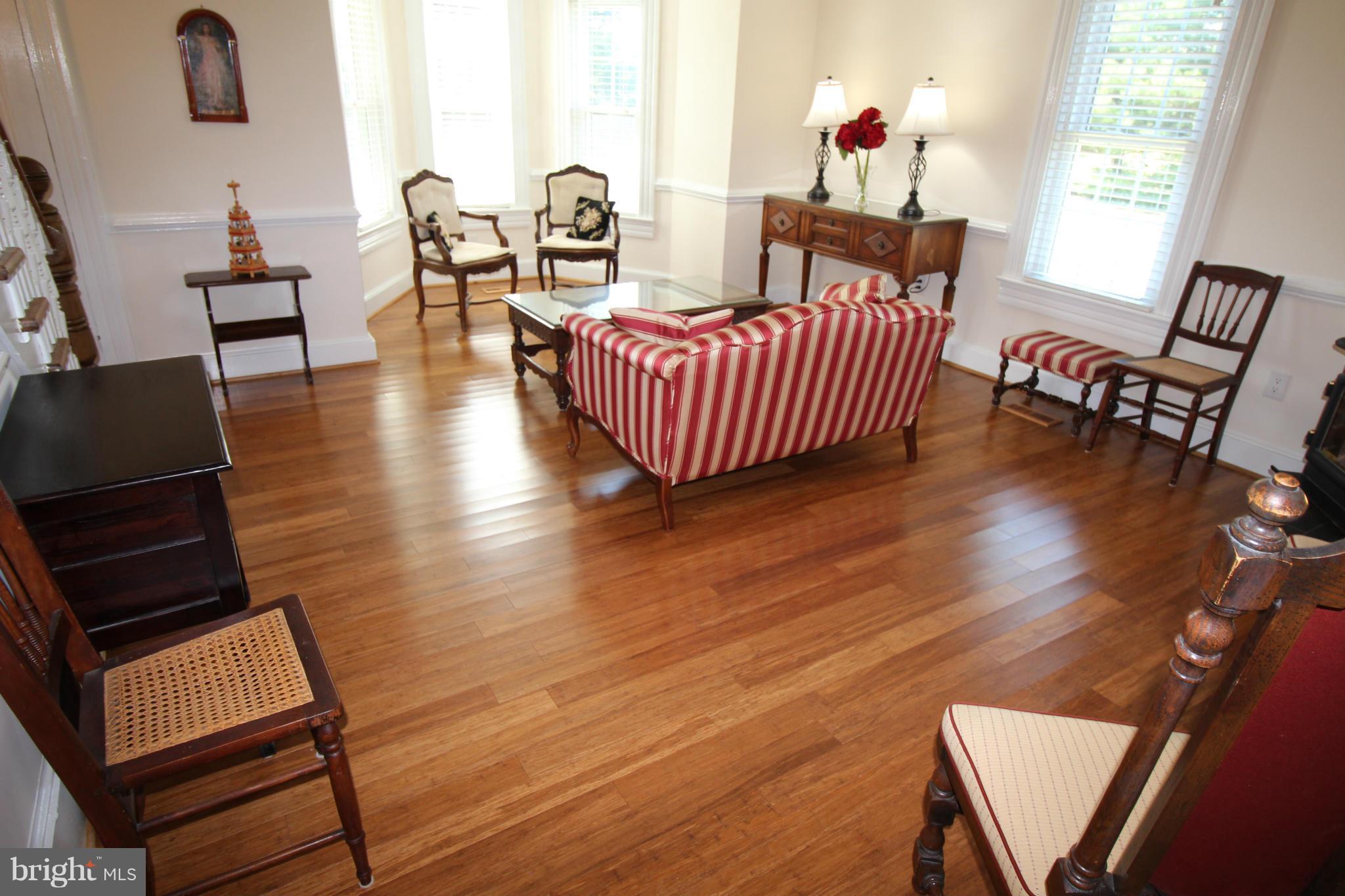 2280 Reliance Road Middletown, VA 22645 - Photo 13 of 28 a living room with furniture and wooden floor