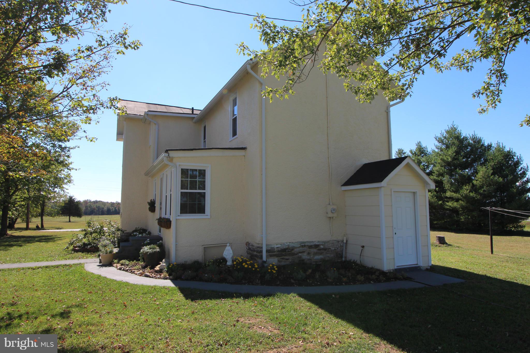 2280 Reliance Road Middletown, VA 22645 - Photo 5 of 28 a front view of a house with garden