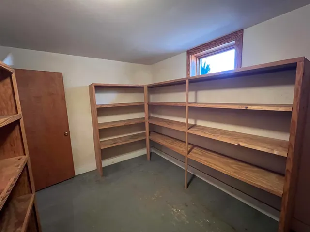 a view of swimming pool with a yard