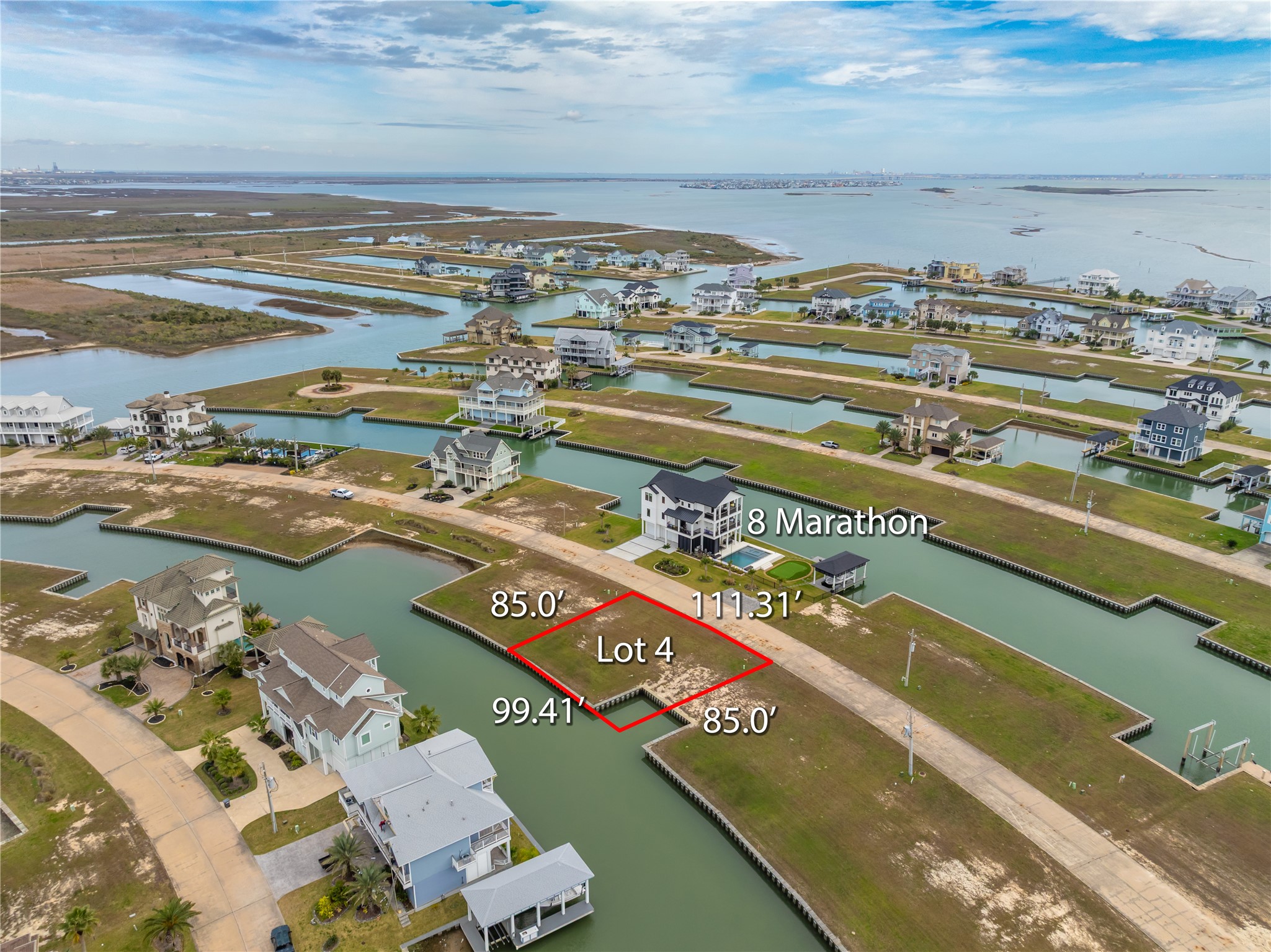 Great location & list value with open water views from every angle. Minutes boat ride to the marina channel, ships store & the Intracoastal Waterway. Front of homesite overlooks neighbors putting green & pool creating open East facing views