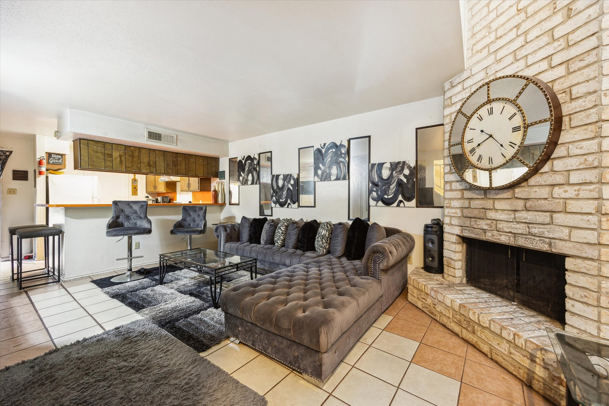 Bright and spacious living area with large windows that allow for plenty of natural light.