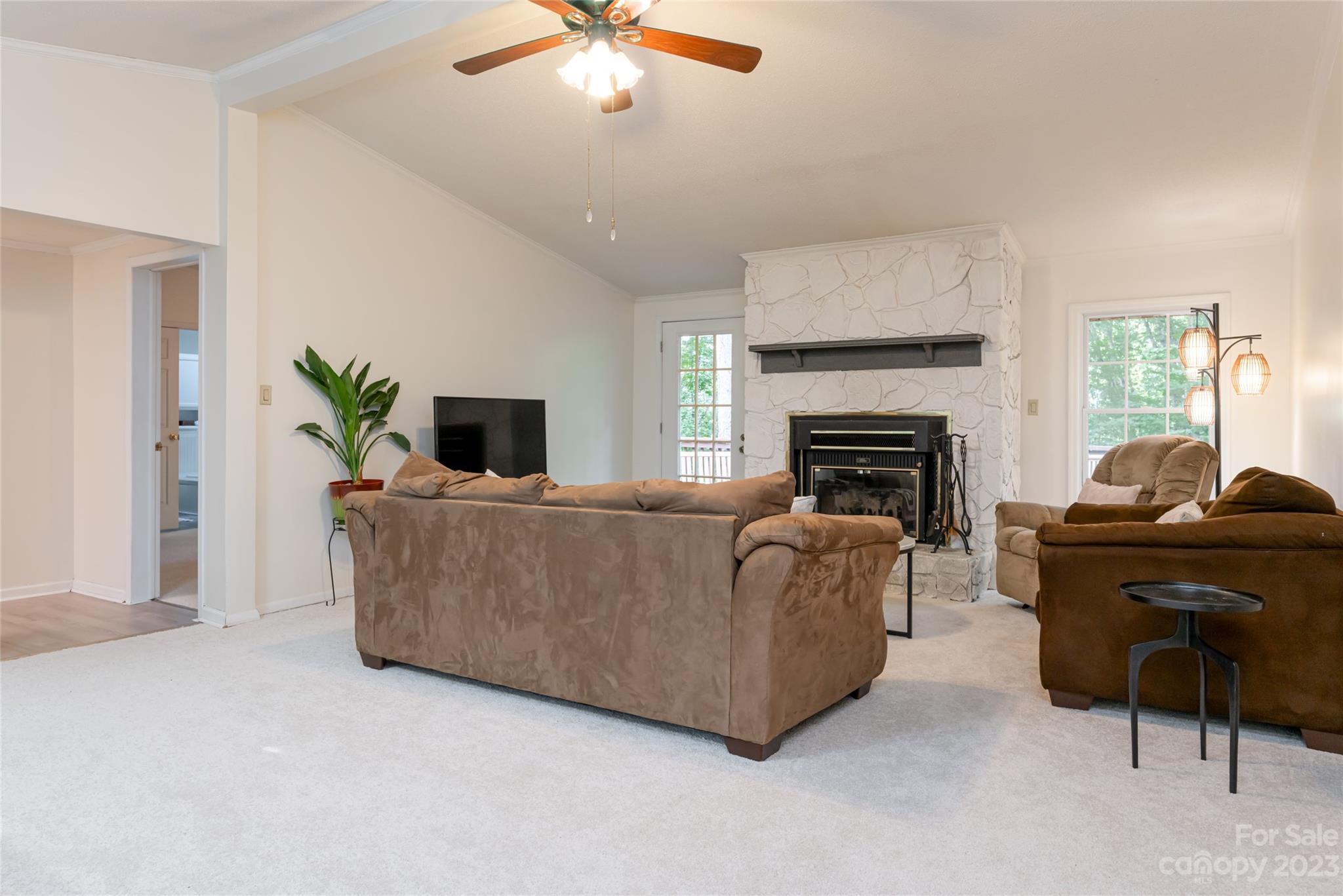 30 Clifford Drive Fairview, NC 28730 - Photo 11 of 47 a living room with furniture and a fireplace
