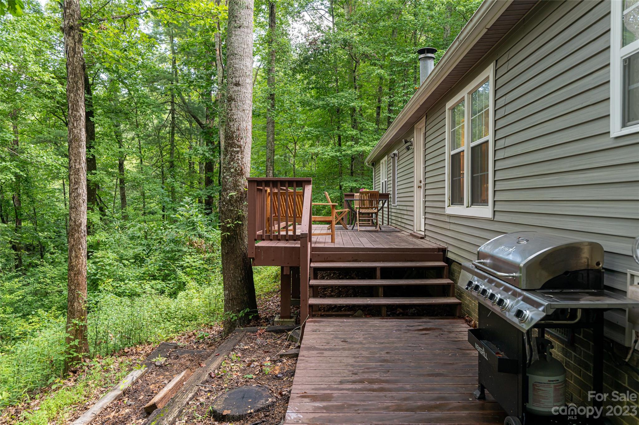 30 Clifford Drive Fairview, NC 28730 - Photo 32 of 47 a front view of a house with a garden
