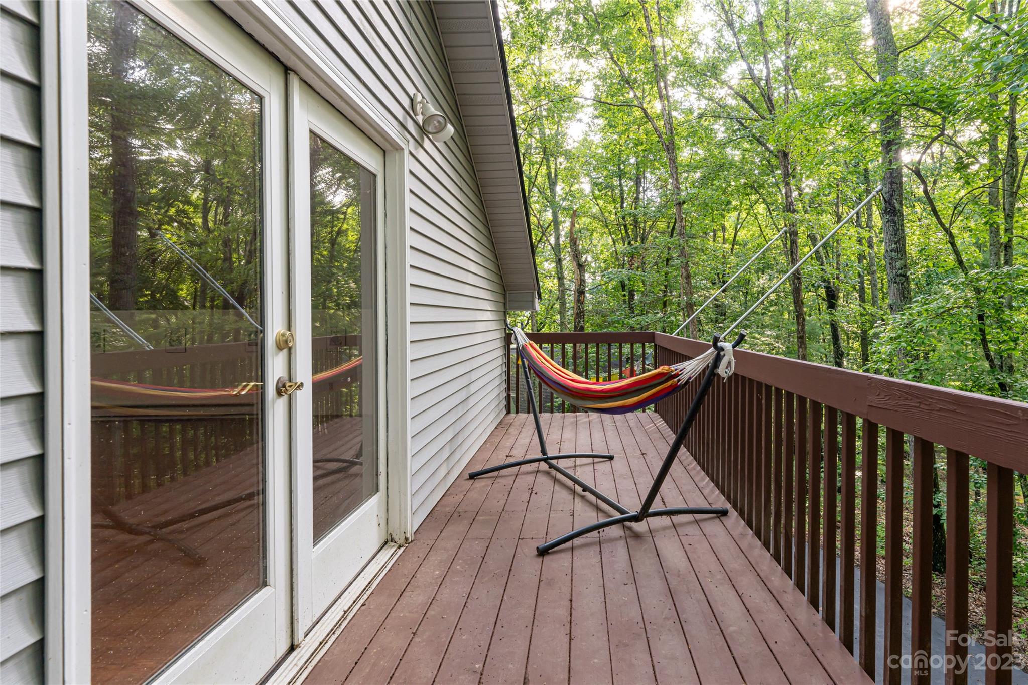 30 Clifford Drive Fairview, NC 28730 - Photo 35 of 47 a view of a balcony with chair and wooden floor