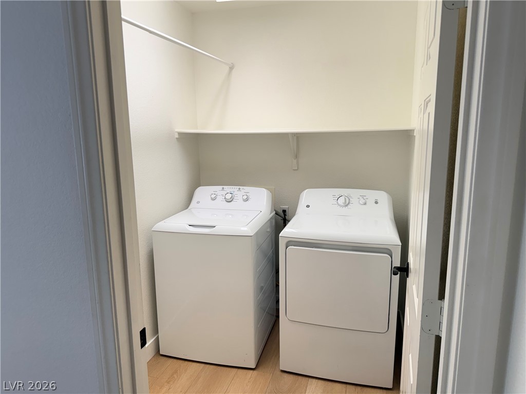 2122 Hidden Ranch Terrace Henderson, NV 89052 - Photo 11 of 20 A dedicated utility space with essential laundry appliances for daily convenience.