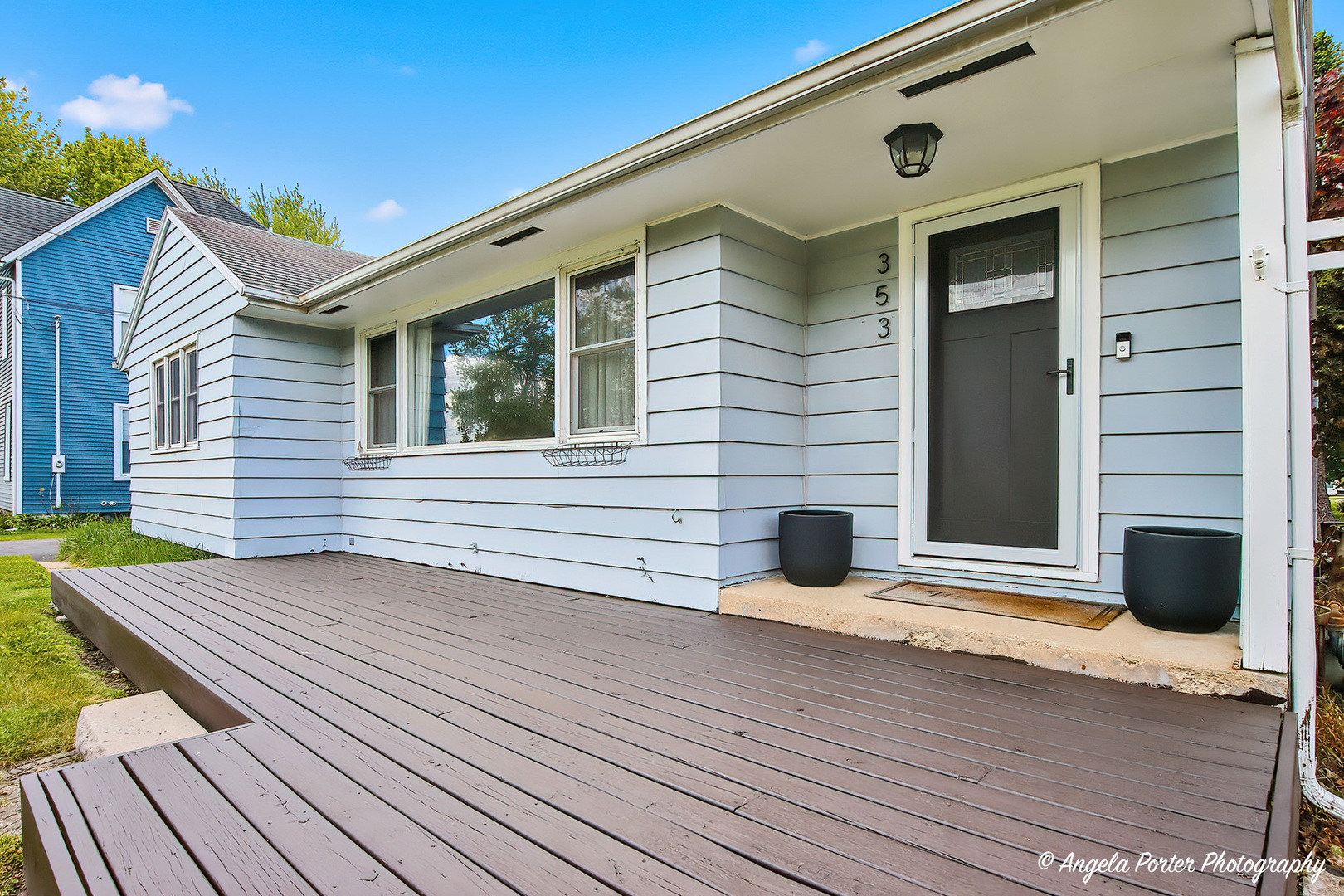 353 Marengo Road Harvard, IL 60033 - Photo 2 of 23 a view of a house with wooden deck and a wooden floor