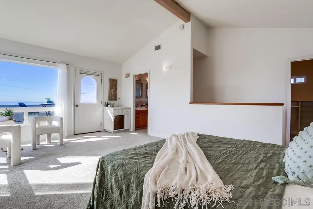 444 Chesterfield Drive Cardiff, CA 92007 - Photo 24 of 29 a bedroom with a bed and a cabinets