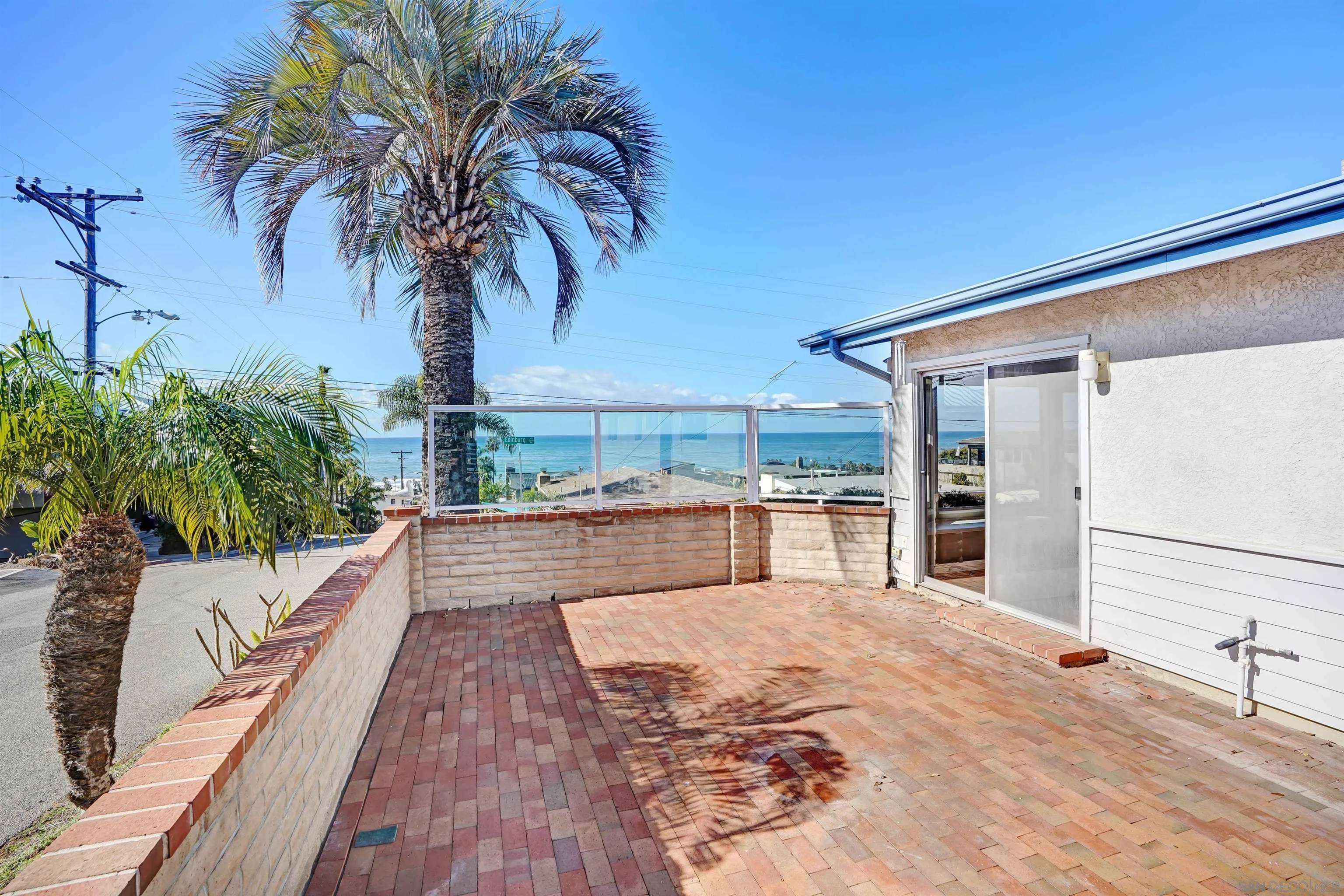 444 Chesterfield Drive Cardiff, CA 92007 - Photo 5 of 29 a view of a swimming pool with a patio