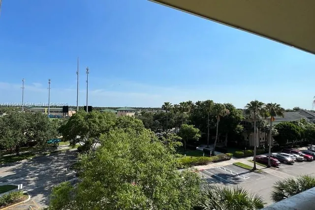 a view of a backyard of the house