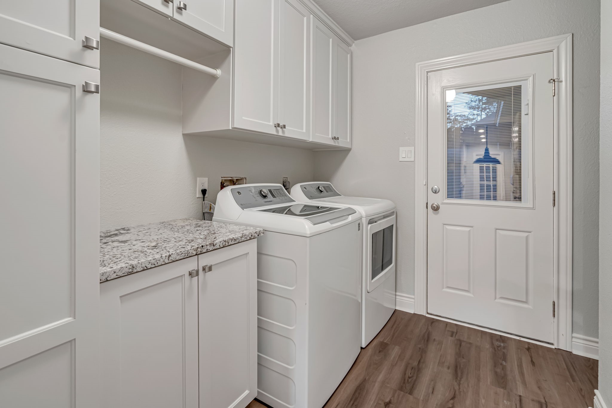 4702 Spring Lane Baytown, TX 77521 - Photo 12 of 34 a utility room with washer and dryer