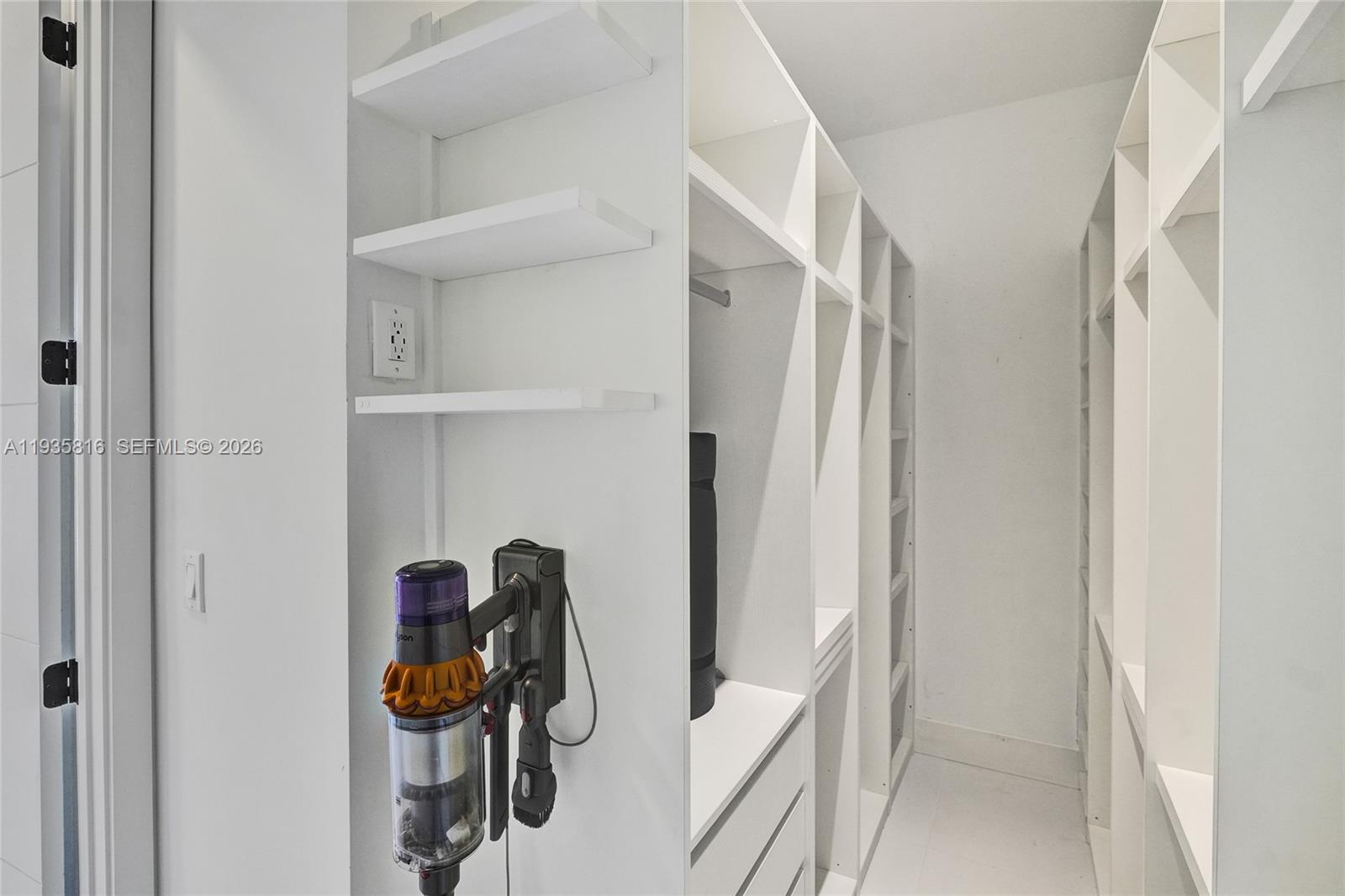 1030 15th Street, Unit PH5 Miami Beach, FL 33139 - Photo 16 of 38 a view of workspace with wooden floor and chair