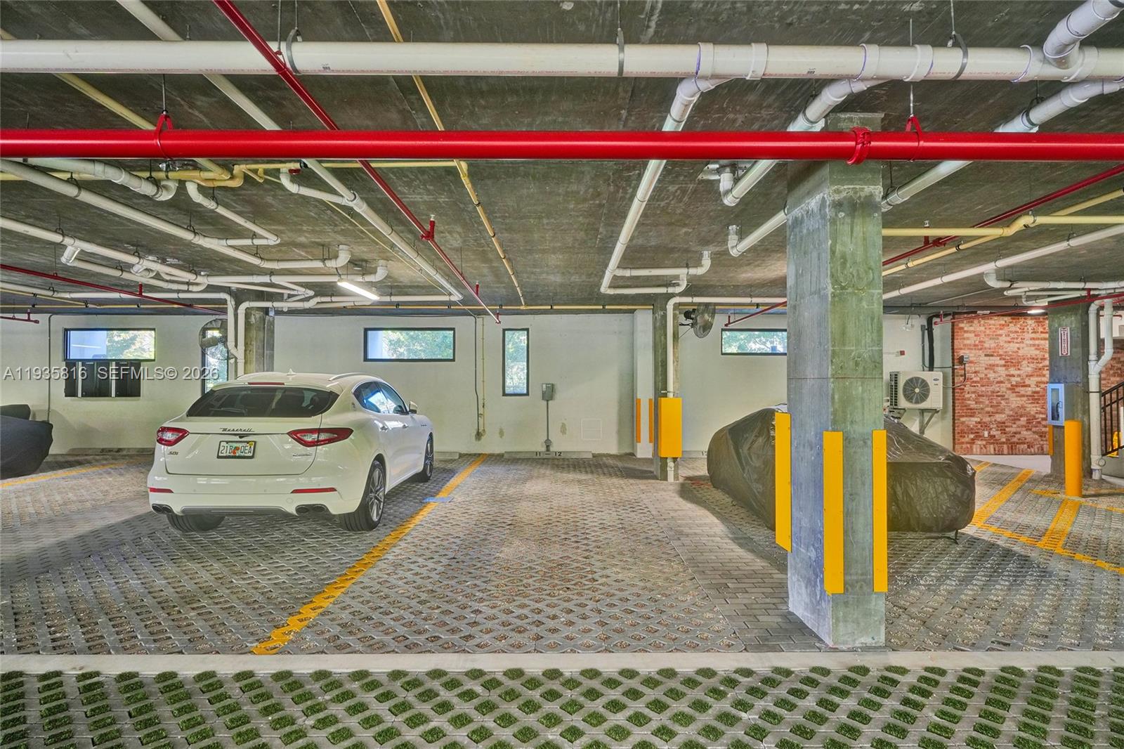 1030 15th Street, Unit PH5 Miami Beach, FL 33139 - Photo 20 of 38 a utility room with truck parked