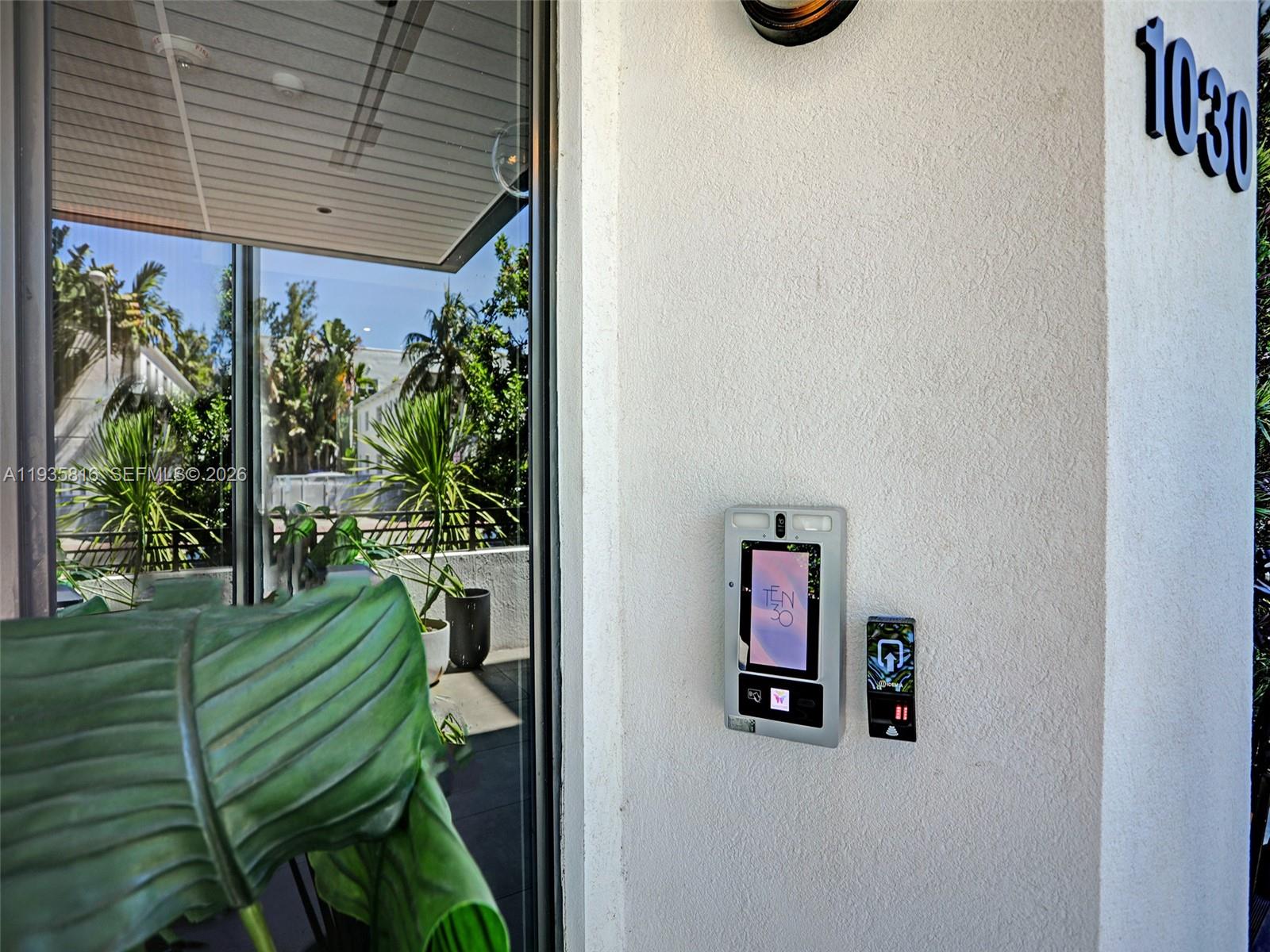 1030 15th Street, Unit PH5 Miami Beach, FL 33139 - Photo 28 of 38 a view of a door and chair in the balcony