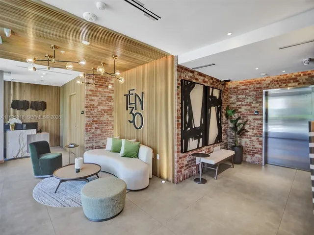 a living room with furniture and a patio