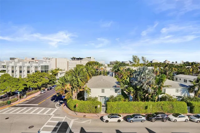 an aerial view of a city with lots of residential buildings
