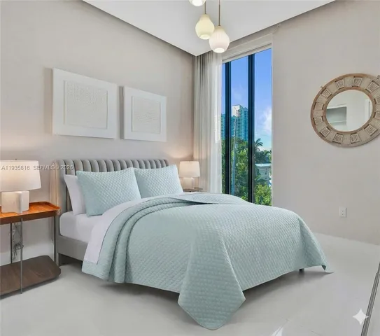 a bedroom with bed and a window