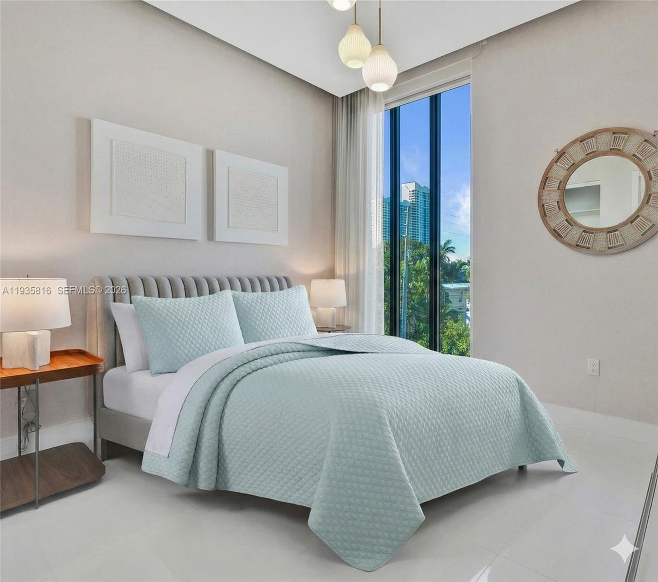 1030 15th Street, Unit PH5 Miami Beach, FL 33139 - Photo 8 of 38 a bedroom with bed and a window