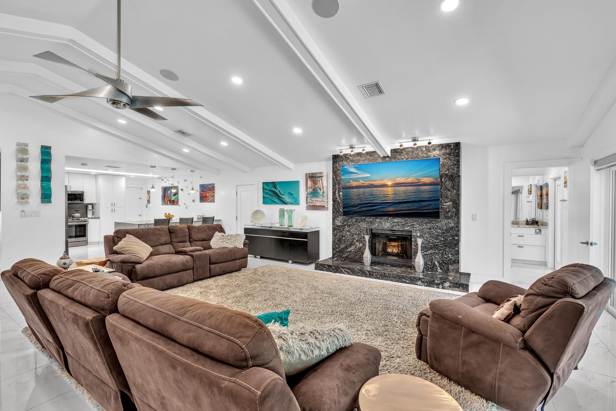 20104 Back 9 Drive Boca Raton, FL 33498 - Photo 11 of 78 a living room with fireplace furniture and a fireplace