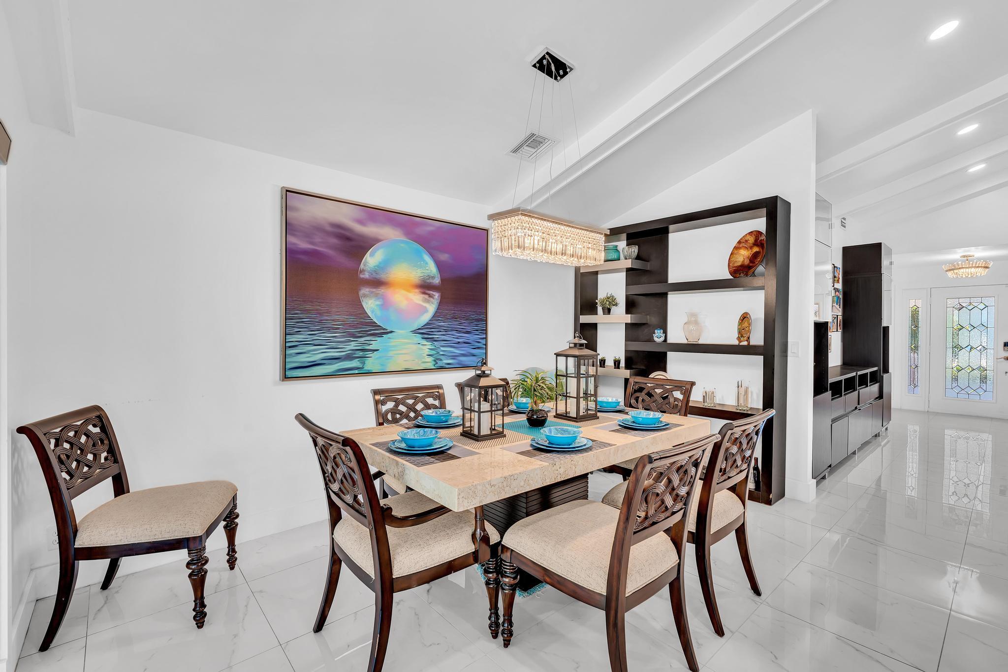 20104 Back 9 Drive Boca Raton, FL 33498 - Photo 26 of 78 a view of a dining room with furniture