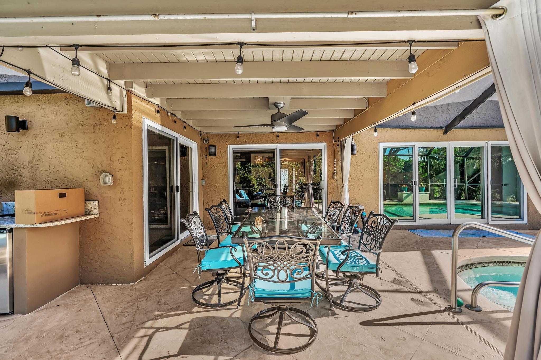 20104 Back 9 Drive Boca Raton, FL 33498 - Photo 57 of 78 a view of a dining room with furniture window and outside view