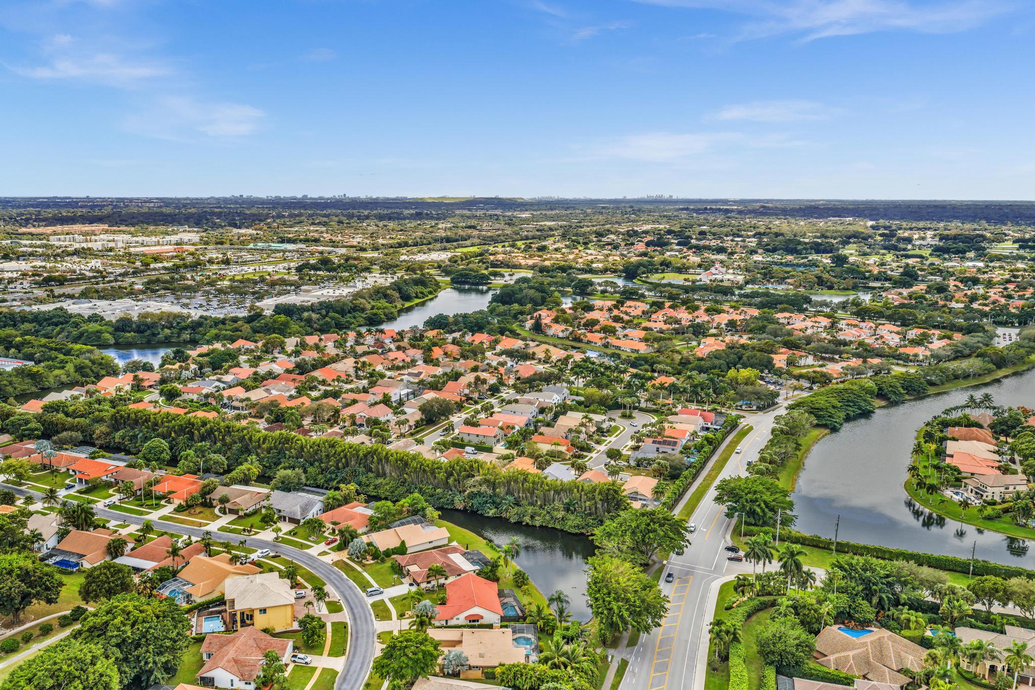 20104 Back 9 Drive Boca Raton, FL 33498 - Photo 69 of 78 an aerial view of residential building and lake