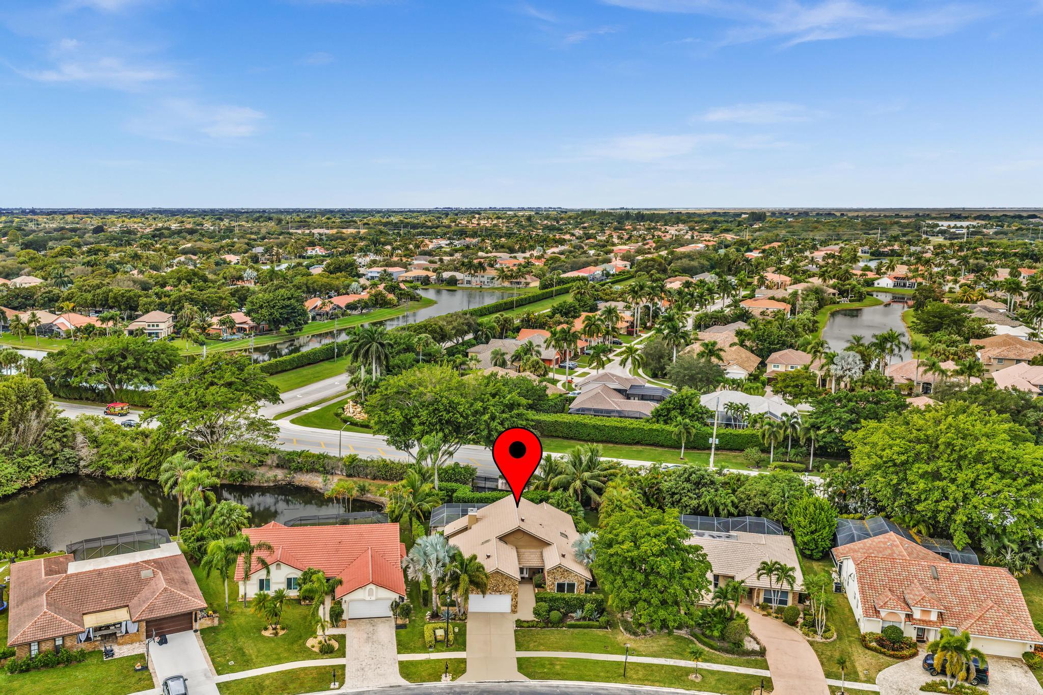 20104 Back 9 Drive Boca Raton, FL 33498 - Photo 74 of 78 an aerial view of residential houses with outdoor space and trees