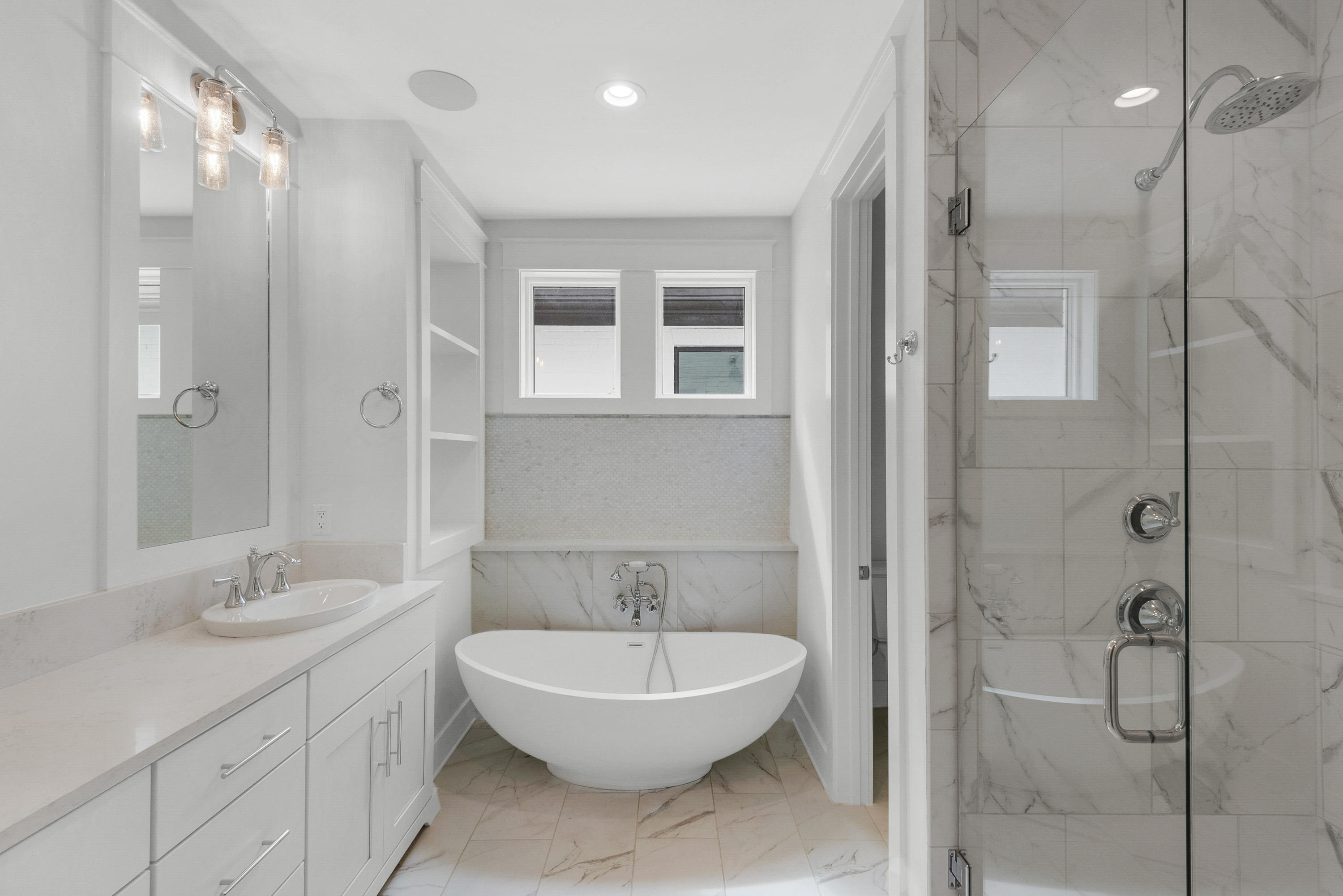 241 Ridgewalk Circle Santa Rosa Beach, FL 32459 - Photo 18 of 41 a bathroom with a bathtub shower sink mirror and toilet