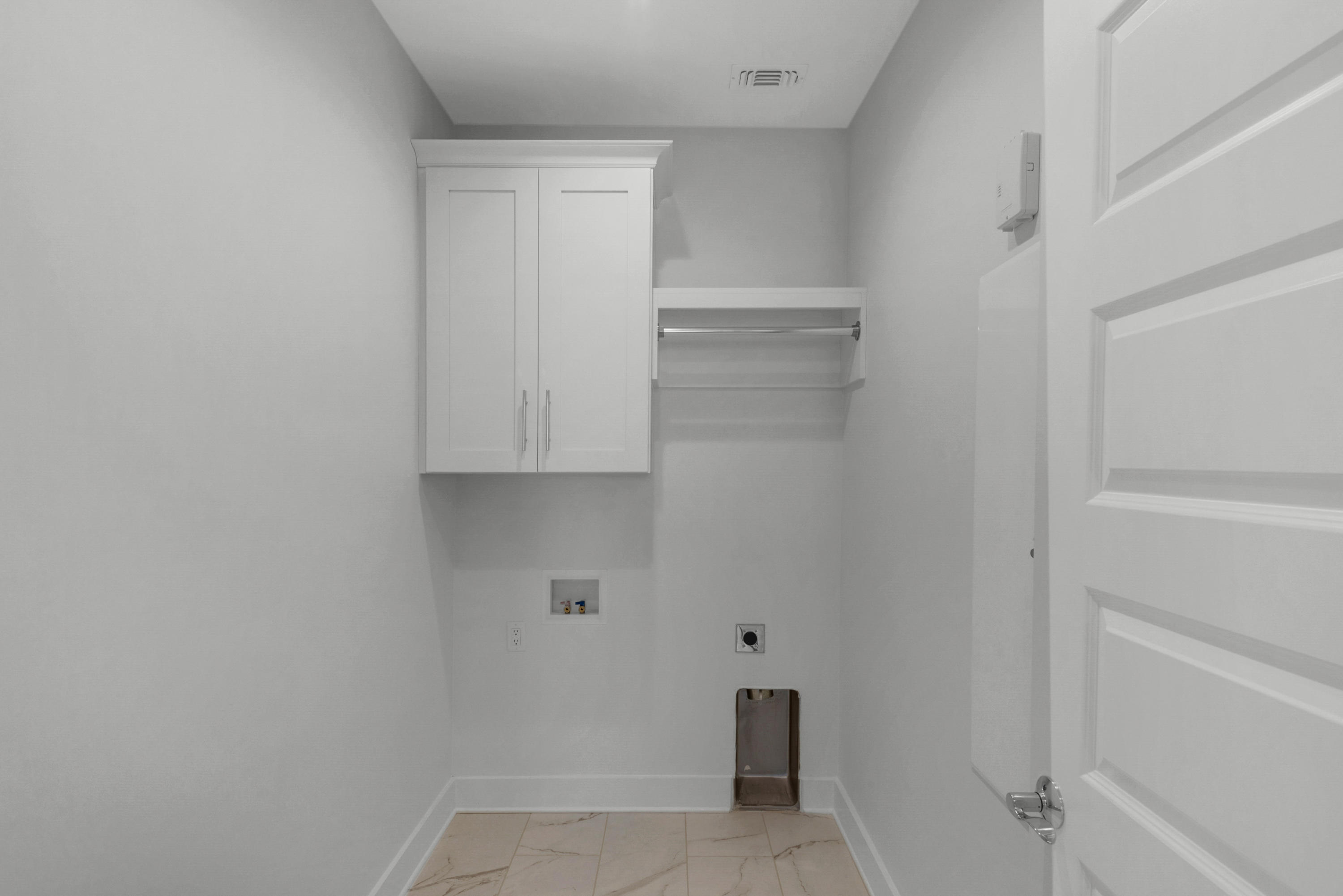 241 Ridgewalk Circle Santa Rosa Beach, FL 32459 - Photo 22 of 41 a view of storage and utility room with empty racks