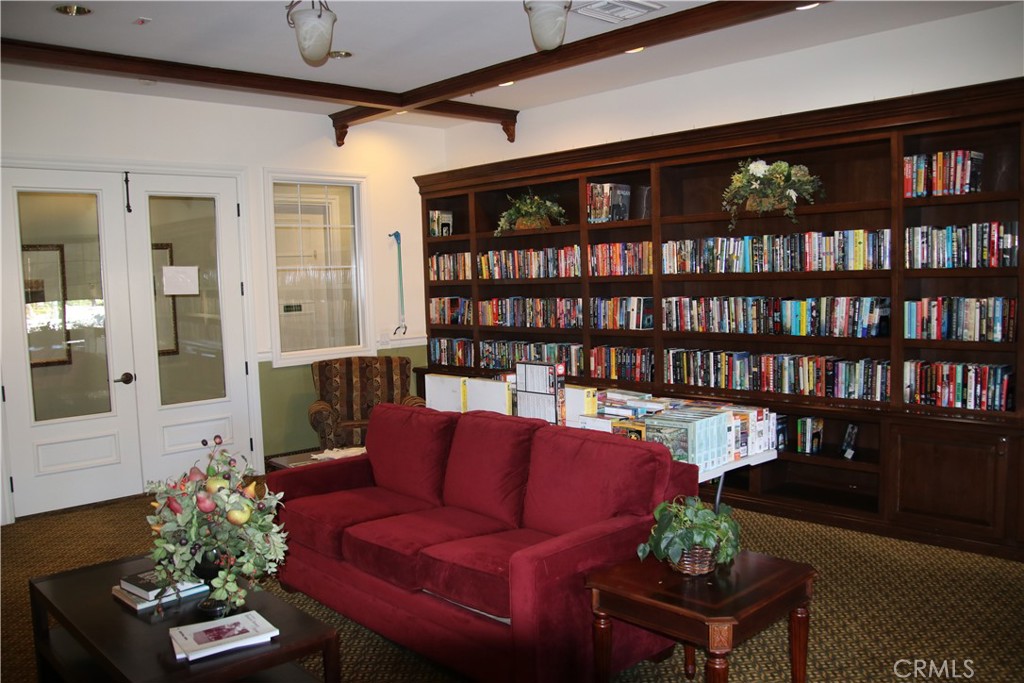 508 Casper Drive Hemet, CA 92545 - Photo 52 of 73 a living room with furniture and book shelf