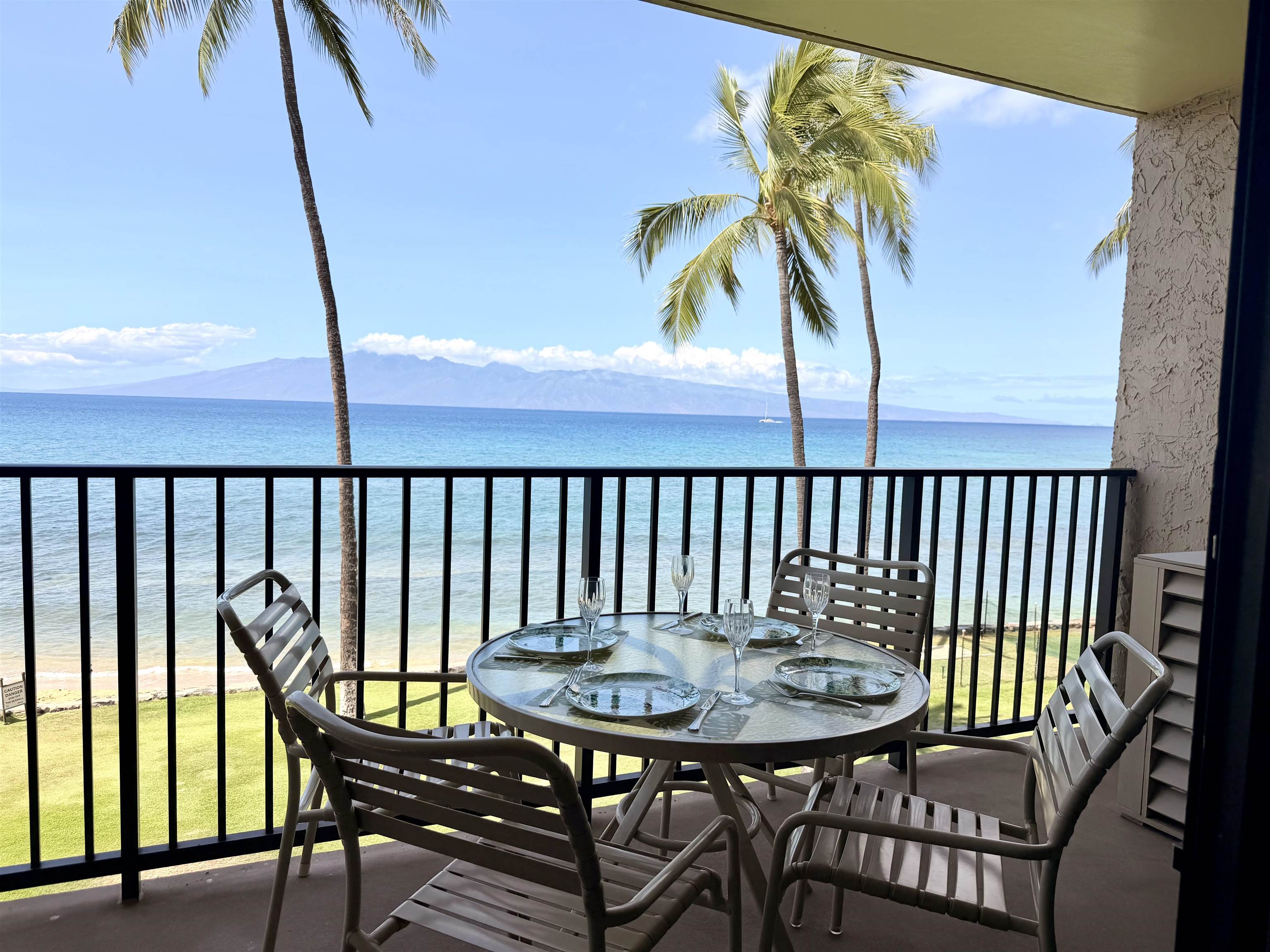 3543 Lower Honoapiilani Road, Unit L302 Lahaina, HI 96761 - Photo 1 of 45 a view of a balcony with furniture