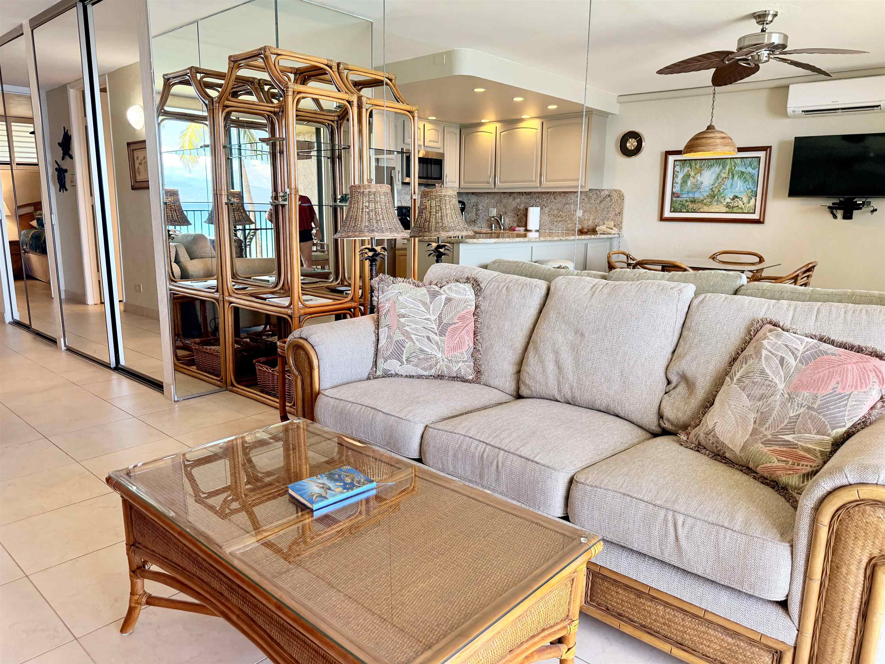 3543 Lower Honoapiilani Road, Unit L302 Lahaina, HI 96761 - Photo 13 of 45 a living room with furniture and a flat screen tv