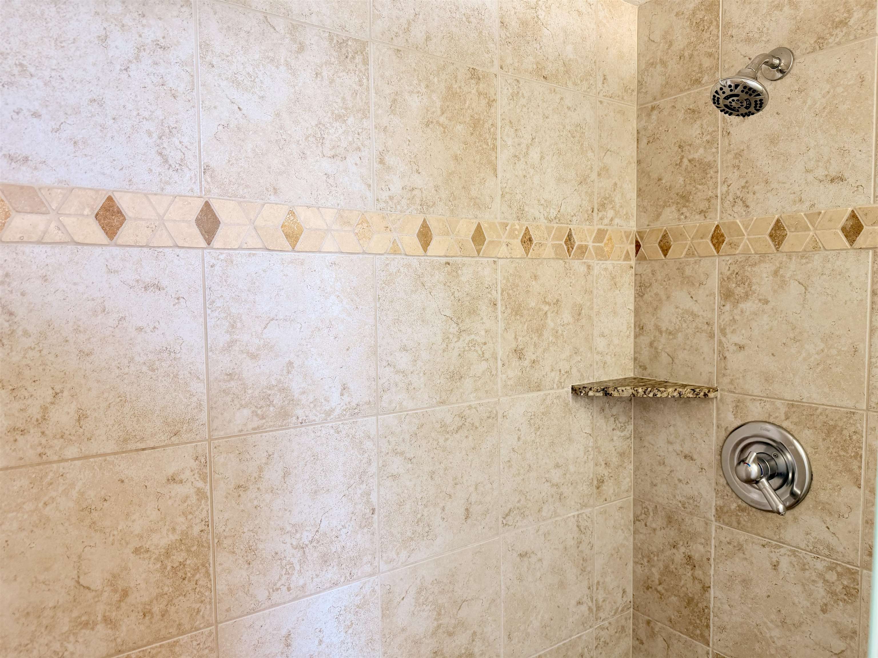 3543 Lower Honoapiilani Road, Unit L302 Lahaina, HI 96761 - Photo 23 of 45 a bathroom with shower and a shower