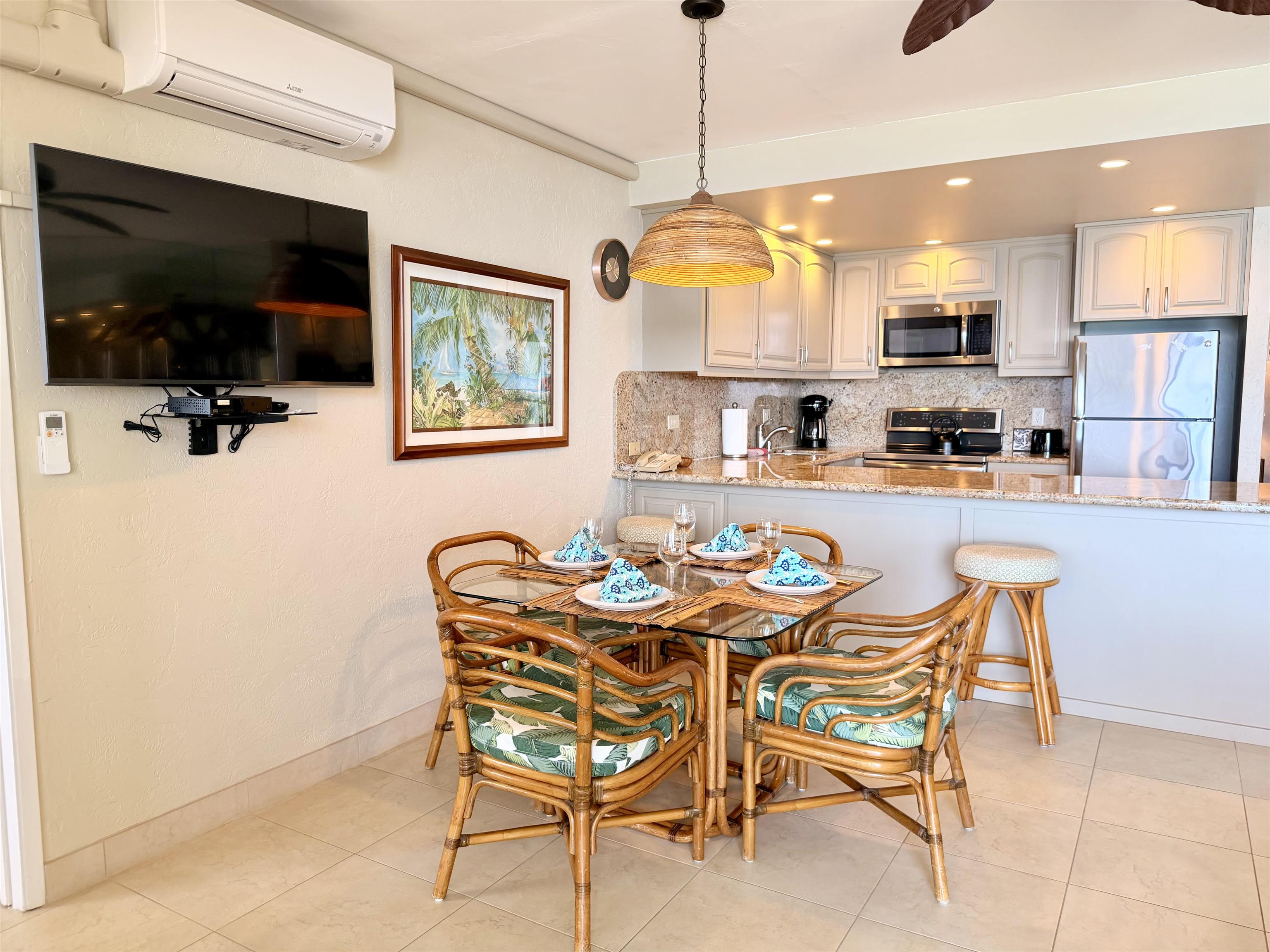 3543 Lower Honoapiilani Road, Unit L302 Lahaina, HI 96761 - Photo 9 of 45 a dining room with furniture and window
