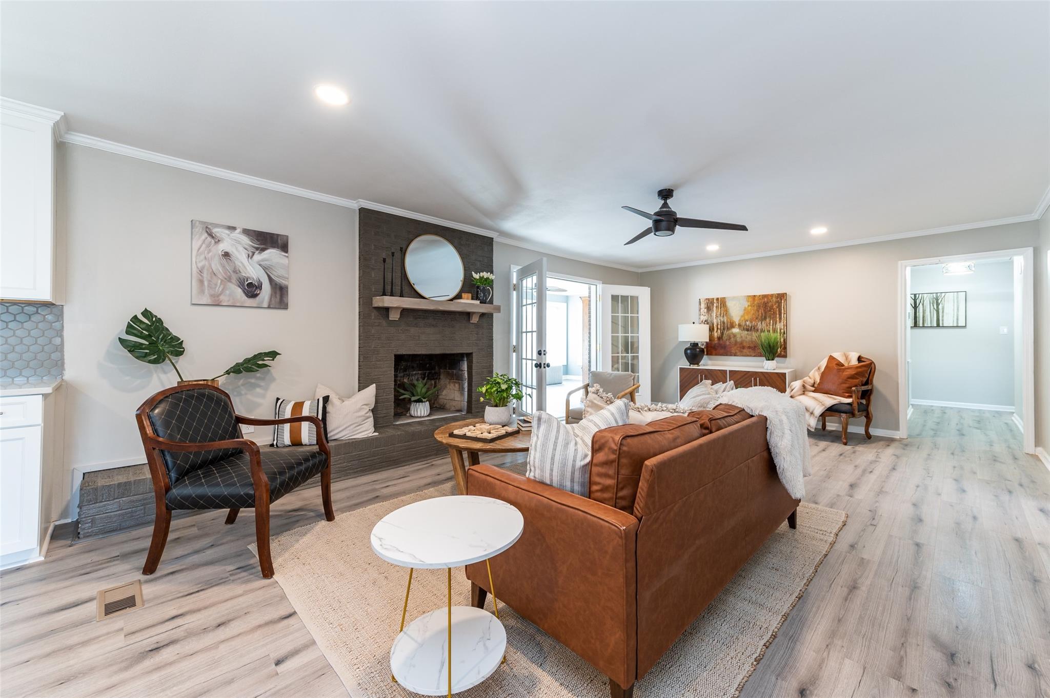 2715 Pineview Drive Lancaster, SC 29720 - Photo 13 of 40 a living room with furniture a fireplace and wooden floor