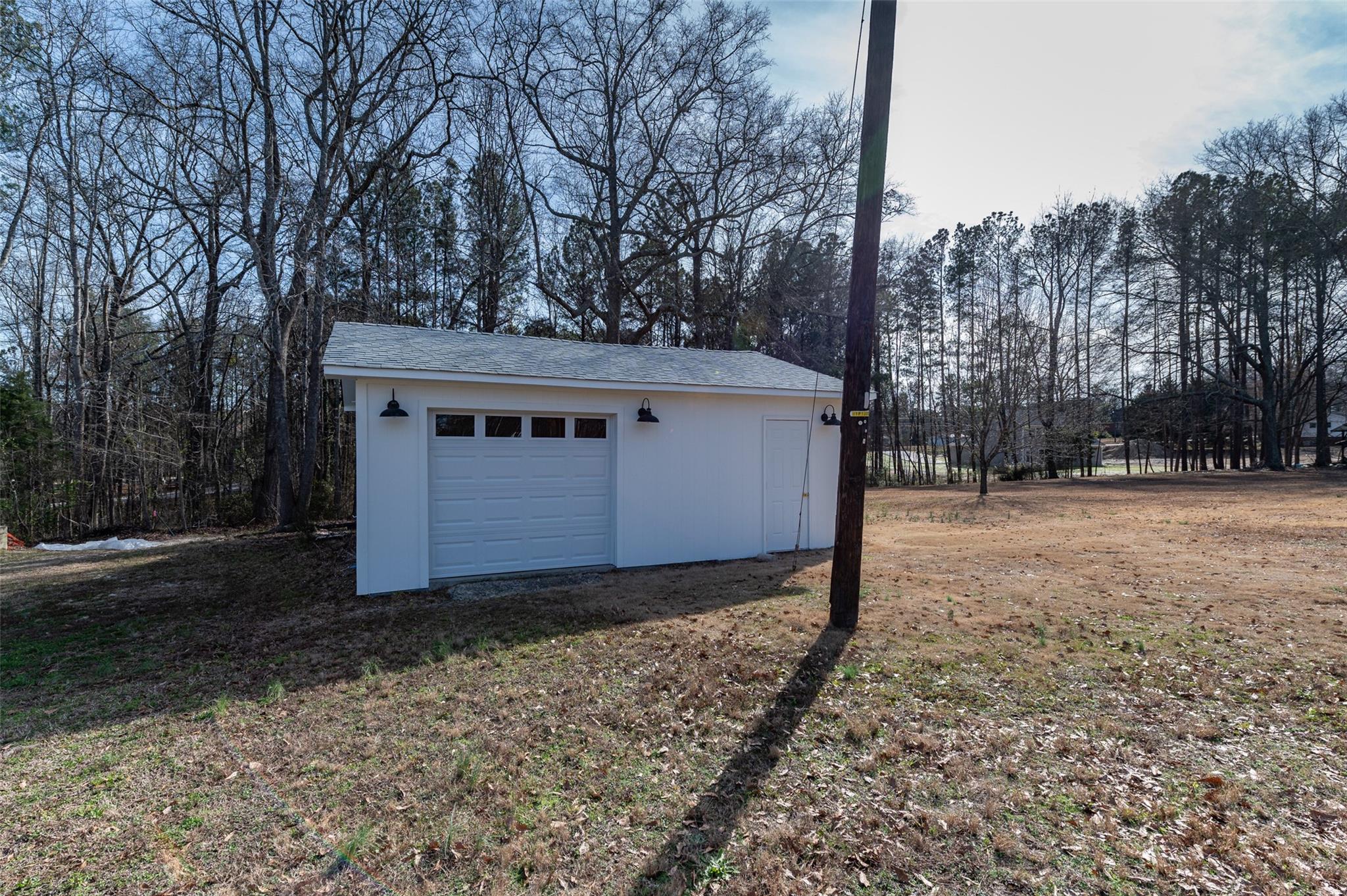 2715 Pineview Drive Lancaster, SC 29720 - Photo 30 of 40 a view of a house with a yard covered with snow