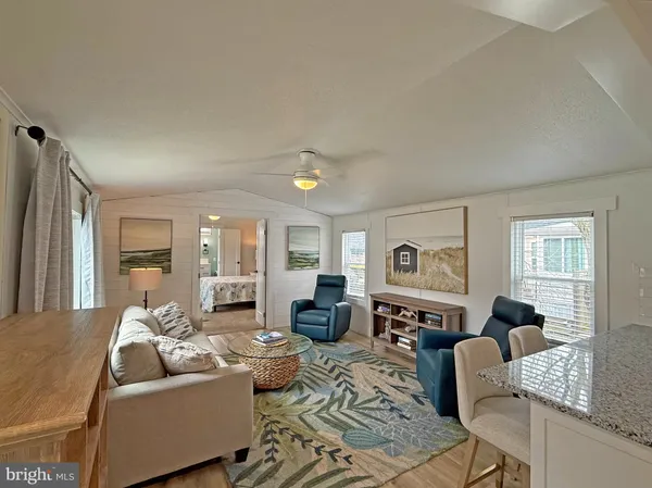 a living room with furniture and a couch