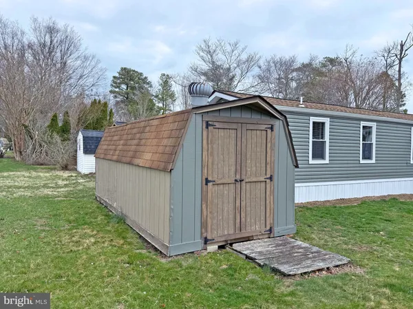 a view of a swimming pool and an outdoor seating