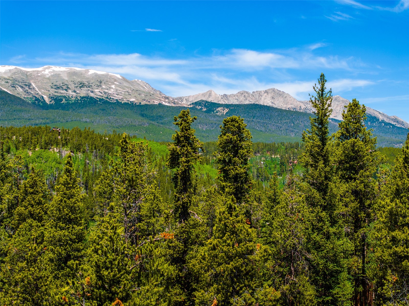 309 Royal Tiger Road Breckenridge, CO 80424 - Photo 7 of 12 a view of a lake with a mountain in the background