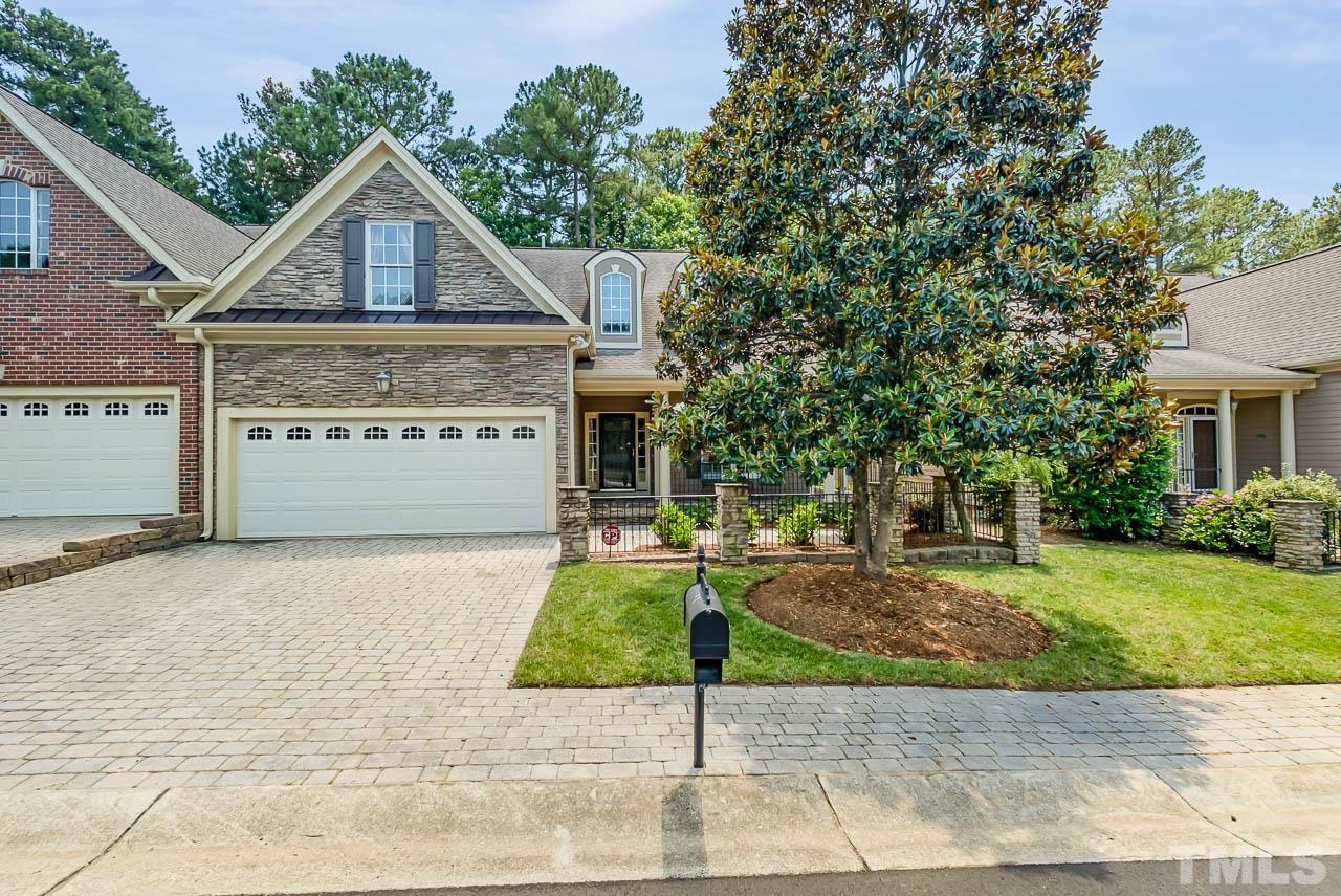 109 Nouveau Avenue Raleigh, NC 27615 - Photo 1 of 29 a view of a house with a yard